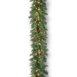 National Tree Company Pre-Lit Artificial Christmas Garland, Green, Garwood Spruce, White Lights, Plug In, Christmas Collection, 9 Feet