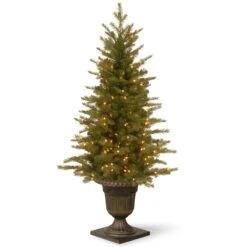 National Tree Company Pre-Lit 'Feel Real' Artificial Mini Entrance Christmas Tree, Green, Nordic Spruce, White Lights, Includes Decorative Urn Base, 4 Feet