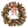 National Tree Company Pre-Lit Artificial Christmas Wreath, Green, Bristle Berry Pine, White Lights, Decorated With Ball Ornaments, Pink Ribbon Bows, Twigs, Christmas Collection, 28 Inches